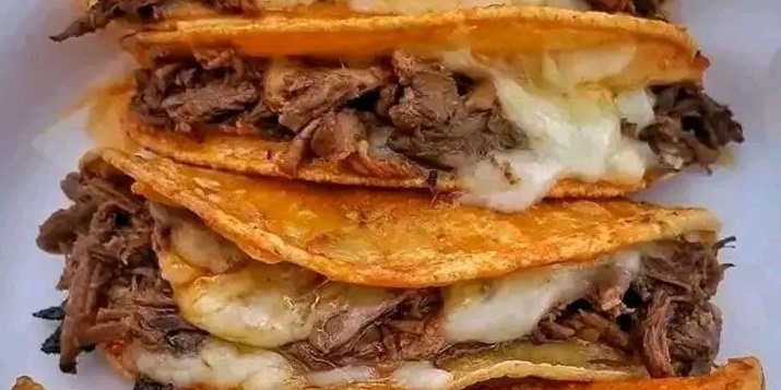 shaved beef melted cheese tcos